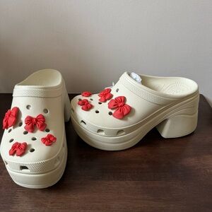 Crocs Womens Siren Clog
Bone  Sandal Heel with Red Rubber Bow